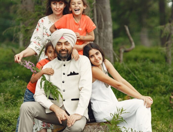 indian-man-forest-male-traditional-turban-international-family-summer-forest_1157-41074