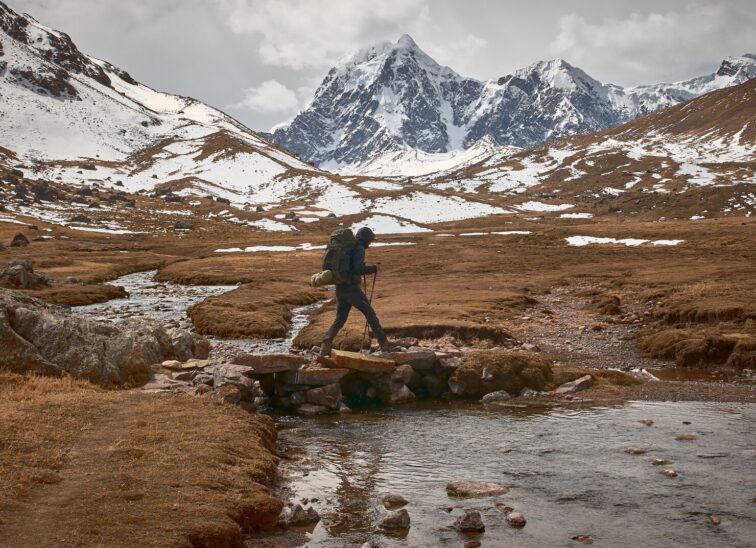 young-hiker-trekking-tour-through-beautiful-andes-mountains-peru_181624-48694